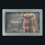 Highland cow calf autumn grass monogram initial belt buckle<br><div class="desc">Highland cow calf autumn grass field photograph. Stunning young calf of highland scottish cattle on an autumn grassy field with muted colours. Beautiful dark hairy orange coat contrasting with light yellow green grass and trees in bokeh in background. Custom personalizable monogram with your name and inital on the left.</div>