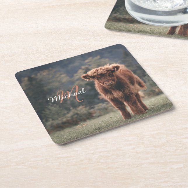 Highland cow calf autumn grass monogram initial square paper coaster (Angled)
