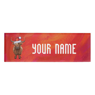 Highland cow in Santa Hat on Red Name Tag