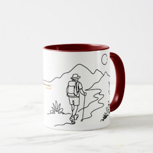 Hiker in desert mug with John Muir quote