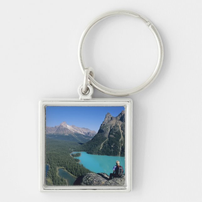 Hiker overlooking turquoise-coloured Lake Key Ring (Front)