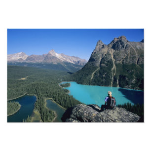 Hiker overlooking turquoise-coloured Lake Photo Print