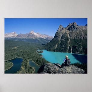 Hiker overlooking turquoise-coloured Lake Poster