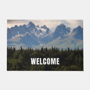 hill with welcome doormat