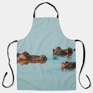 HIPPOS COOLING OFF IN THE DAM APRON