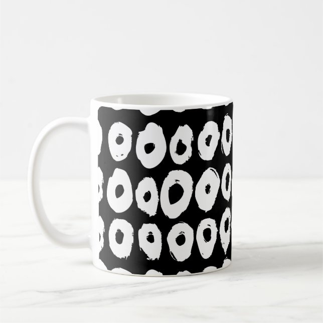 Hipster style pattern with doughnut like shapes in coffee mug (Left)