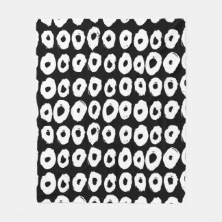 Hipster style pattern with doughnut like shapes in fleece blanket