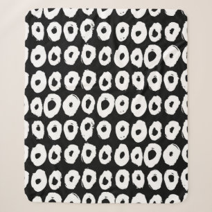 Hipster style pattern with doughnut like shapes in sherpa blanket