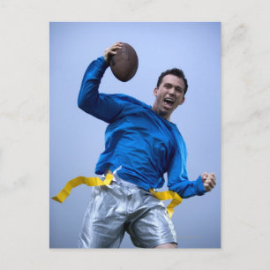 Hispanic man throwing a football postcard