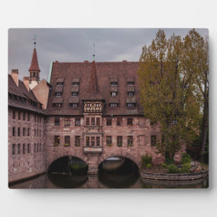 Historic building at sunset in Nuremberg, Germany Plaque