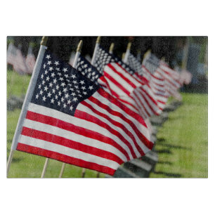 Historic military cemetery with US flags Cutting Board