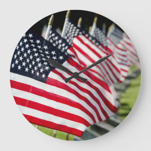Historic military cemetery with US flags Large Clock