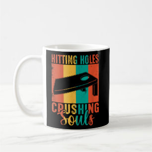 Hitting holes and Crushing Souls Cornhole Coffee Mug