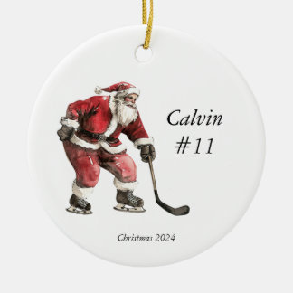 Hockey Santa and Pine Trees Christmas Wrapping Ceramic Ornament