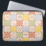 HOGWARTS™ QUIDDITCH™ Team Checker Pattern Laptop Sleeve<br><div class="desc">Celebrate the magic of the wizarding world with this charming checkered icon pattern design. Featuring a playful patchwork of house-inspired colors, broomsticks, magical balls, crests, and other wizarding symbols, this all-over print blends classic charm with whimsical detail. The alternating checkerboard layout gives the design a cozy, quilt-like feel, while the...</div>