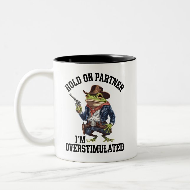 Hold On Partner I'm Overstimulated Cowboy Frog  Two-Tone Coffee Mug (Left)