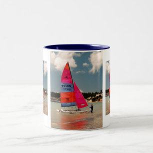 Holding the Hobie steady Two-Tone Coffee Mug