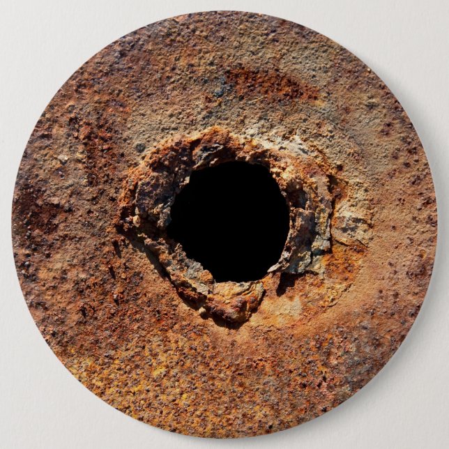 Hole in rust 6 cm round badge (Front)