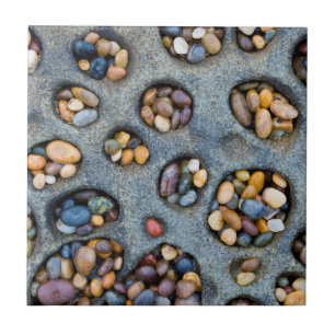 Holes filled with pebbles, CA Ceramic Tile