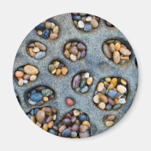 Holes filled with pebbles, CA Magnet