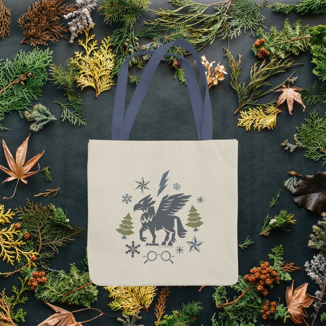 Holiday Buckbeak Winter Graphic Tote Bag (Tote bag over fall leaves background)