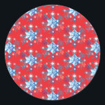 Holiday red and blue snowflakes and stars classic round sticker<br><div class="desc">Holiday red and blue snowflakes and stars pattern.
Need more? Check out other holiday designs at my store! Cheers! :)</div>