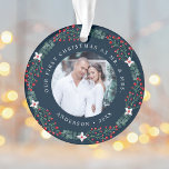 Holly Berry Wreath First Christmas Wedding Photo Ornament<br><div class="desc">Festive, elegant newlywed Christmas ornament featuring 2 of your favourite wedding photos encircled by a wreath of holly berries, green eucalyptus, and white flowers with a navy background. The ornament features "Our First Christmas as Mr. & Mrs." in white text on the front and back. Personalise the ornament by adding...</div>