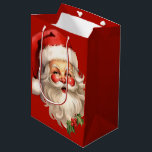 Holly Jolly Santa Claus Retro Christmas Medium Gift Bag<br><div class="desc">Gift bag with a joyful illustration of a vintage style Santa Claus with red rosy cheeks. wearing his classic red Santa hat and his big white bear. A sprig of holly adds to the festive holiday spirit of this design.</div>