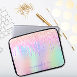 Holographic unicorn glitter rainbow monogram glam laptop sleeve<br><div class="desc">A trendy holographic background with unicorn and rainbow pastel colours in pink, purple, rose gold, mint green. Decorated with faux glitter drips in rose gold, pink and purple. Personalise and add a name, written with a modern hand lettered style script with swashes. Purple coloured letters. To keep the swashes only...</div>