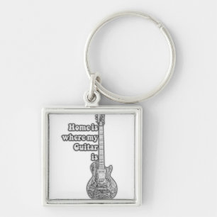 Home is where my guitar is. vintage black & white key ring