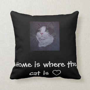 “Home is where the cat is” throw pillow