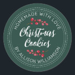 Homemade Christmas Cranberry Cookies Dark Green Classic Round Sticker<br><div class="desc">Rustic and modern homemade baked goods sticker with the text homemade with love, christmas cookies and your name in off-black handwritten script calligraphy and modern typography on a dark green background with a stylish touch of cranberries sprigs. Simply add your name and the product name to the label. Exclusively designed...</div>