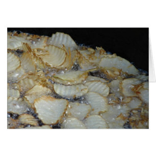 Homemade Potato Chips Frying In Oil