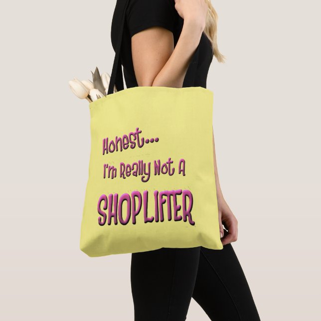 honest... I'm really not a shoplifter Tote Bag (Close Up)