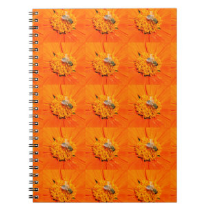 honeybees on orange notebook