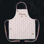 Honeycomb Bee Beekeeper Pink Personalised Apron<br><div class="desc">This personalised design has your name with a pink script font and a pale pink honeycomb pattern with realistic-looking bees sitting on different areas of the apron. This apron would be fun to wear at Farmer's Markets or Fairs, or at the Apiary while you're processing the honey. If you're not...</div>