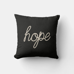Hope rope text on black cushion