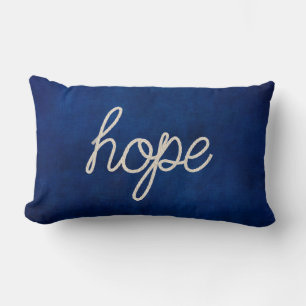 Hope rope text on dark blue lumbar cushion