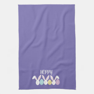 Hoppy Easter Decoration with Easter Eggs Tea Towel