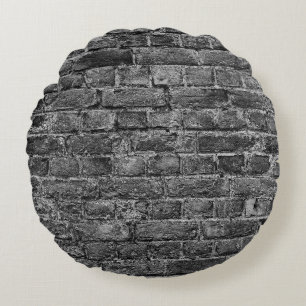 horizontal part of black painted brick wallwall,br round cushion