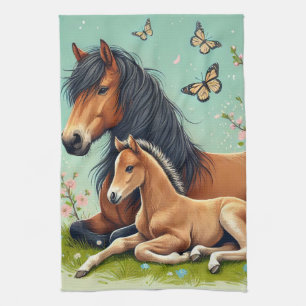 Horse and Foal Resting in a Spring Setting Tea Towel