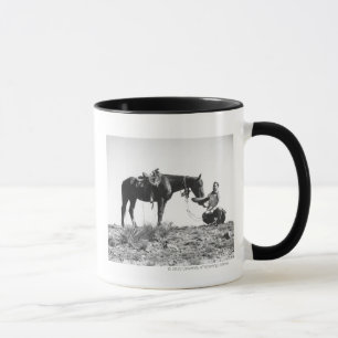 Horse eating from a cowboy's hat. mug