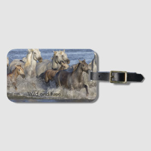 Horses galloping in the water luggage tag
