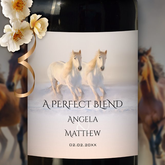 Horses in Snow Winter Wedding Wine Label (Wedding wine label featuring two white horses running in the snow at sunset)