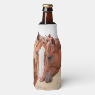 Horses nuzzling in a pasture bottle cooler
