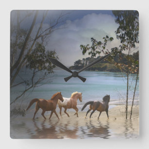 Horses running on the beach clock