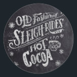 Hot Cocoa Bar Chalkboard Classic Round Sticker<br><div class="desc">This chalkboard hot cocoa bar sticker features chalk hand lettering that says "Old Fashioned Sleigh Rides and Hot Cocoa" on a faux chalkboard background. The lettering features decorative swashes and ornamental swirls.</div>