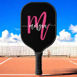 Hot Pink Black Modern Script Girly Monogram Name Pickleball Paddle<br><div class="desc">Elevate your pickleball game with our Hot Pink Modern Script Girly Monogram Name Pickleball Paddle! Featuring a vibrant hot pink design and personalised with your name in an elegant modern script, this paddle adds a stylish, feminine touch to your matches. Designed for both performance and flair, it offers a comfortable...</div>