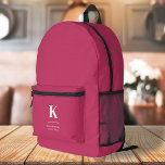 Hot Pink Feminine Girly Typographic Monogram Printed Backpack<br><div class="desc">A minimalist vertical design in an elegant style with a hot pink feature colour and large typographic initial monogram. The text can easily be customised for a design as unique as you are!</div>
