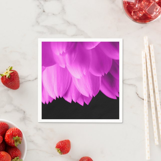 Hot pink flower petals on black napkin (Insitu)